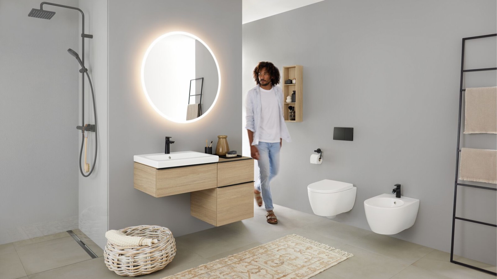 A bathroom with the shower area in the niche