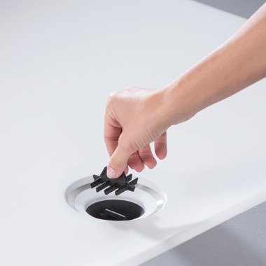 Hair catcher integrated into the drain of the Geberit Setaplano shower surface Hair catcher integrated into the drain of the Geberit Setaplano shower surface