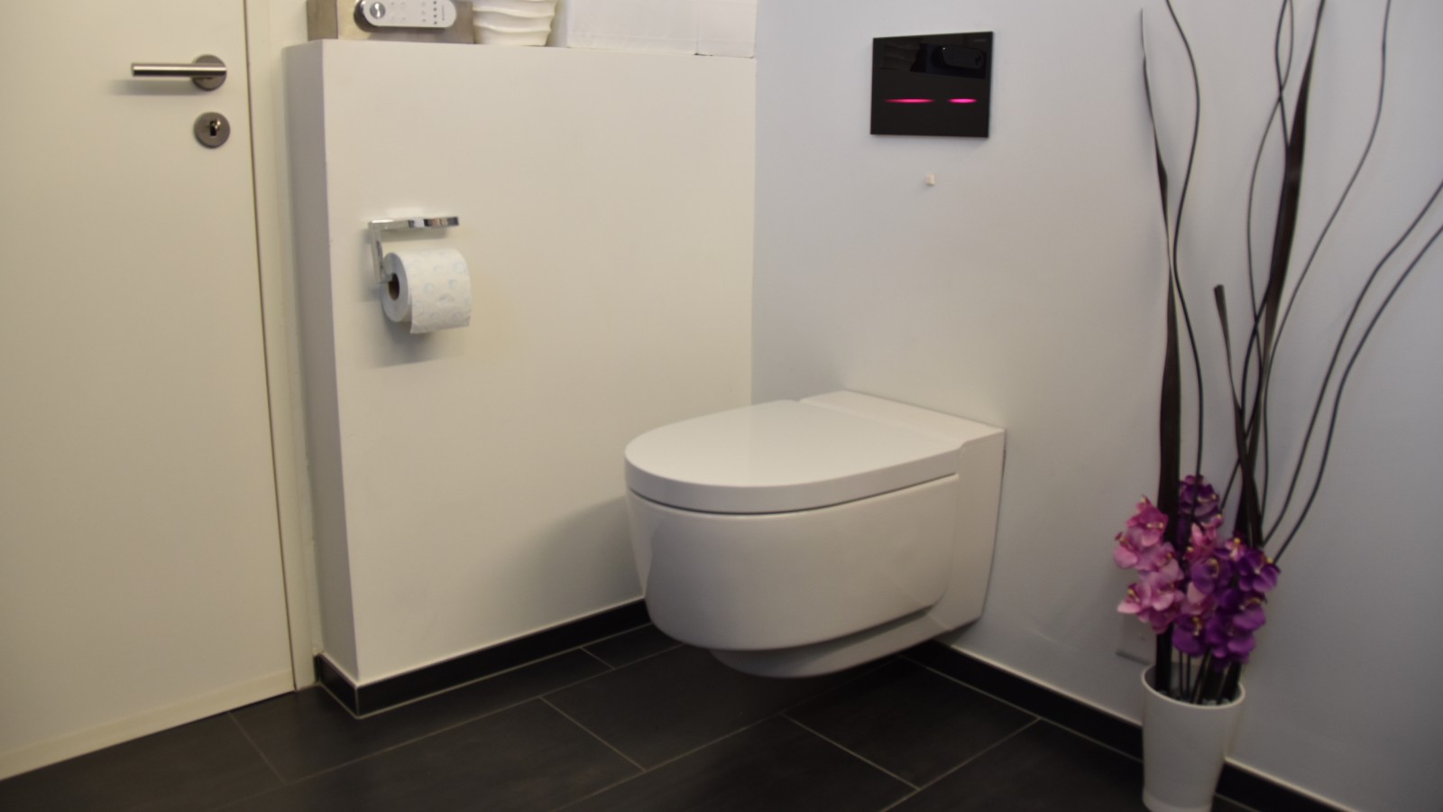 Bathroom after renovation with various Geberit products