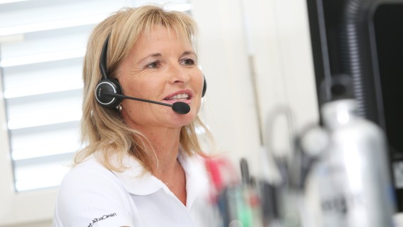 Member of the Geberit AquaClean customer service team on the phone