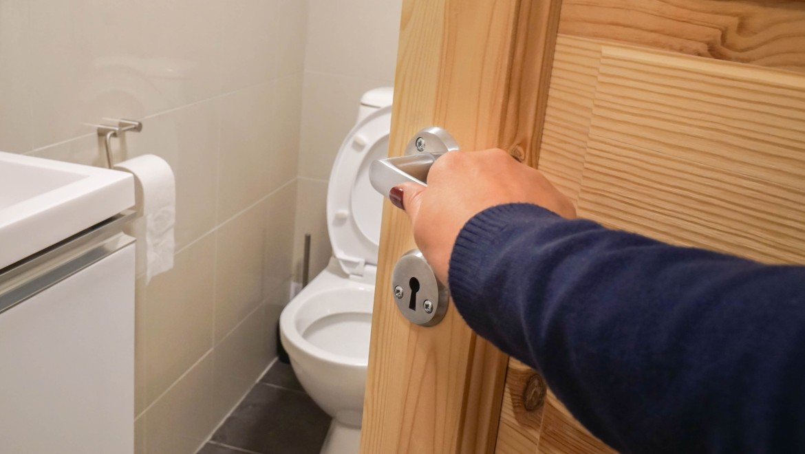 Bathroom door that opens inwards